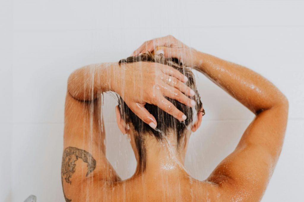 Massage the shampoo gently using your fingertips to lift buildup and stimulate circulation. For most hair types, washing two to three times per week supports balanced scalp health and stronger hair growth.