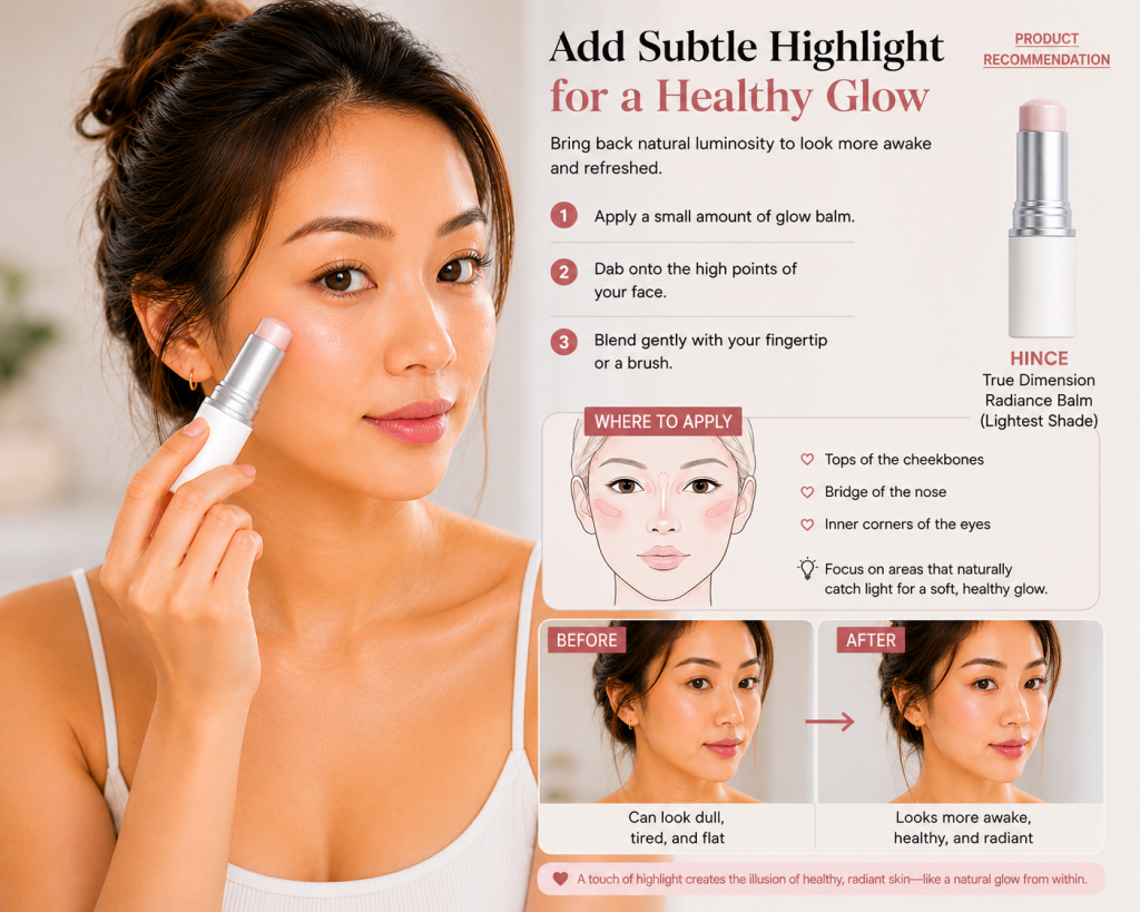 Woman applying highlighter to her cheekbone, demonstrating where to add subtle glow for a fresh, healthy-looking everyday makeup look.